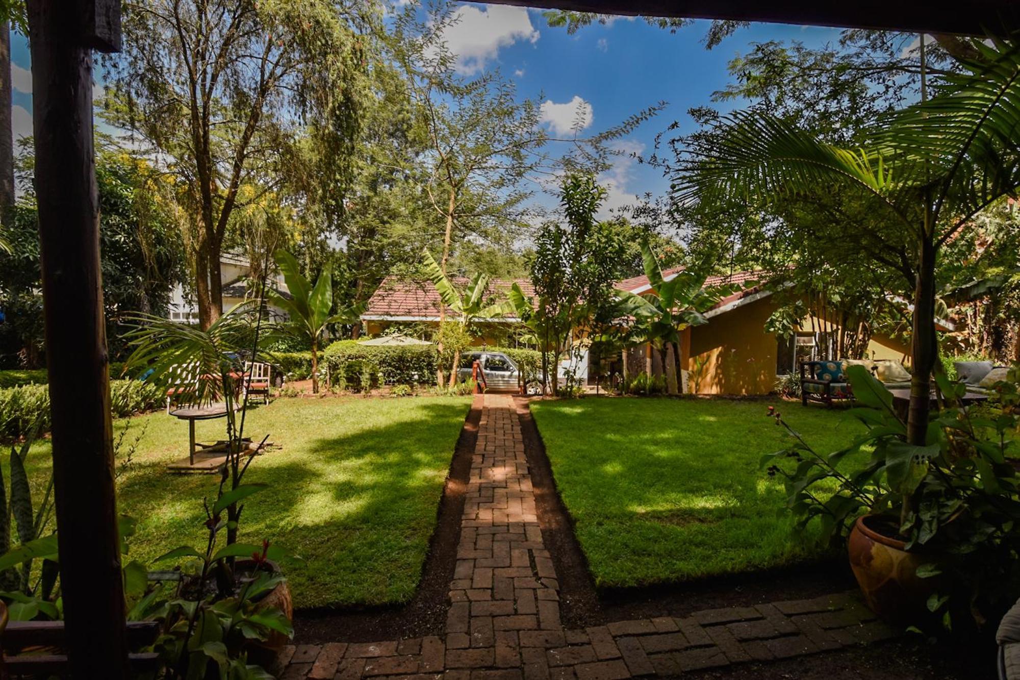 Utamaduni House B&B Аруша Экстерьер фото